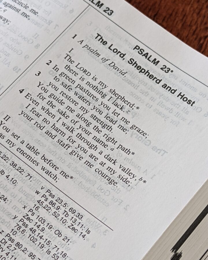 An open copy of the Scriptures showing Psalm 23.